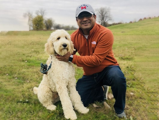 Dr. Adatrow enjoys spending time with his dog Oscor being a dental expert in Cordova TN