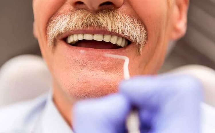  When is it necessary to remove a dental implant?